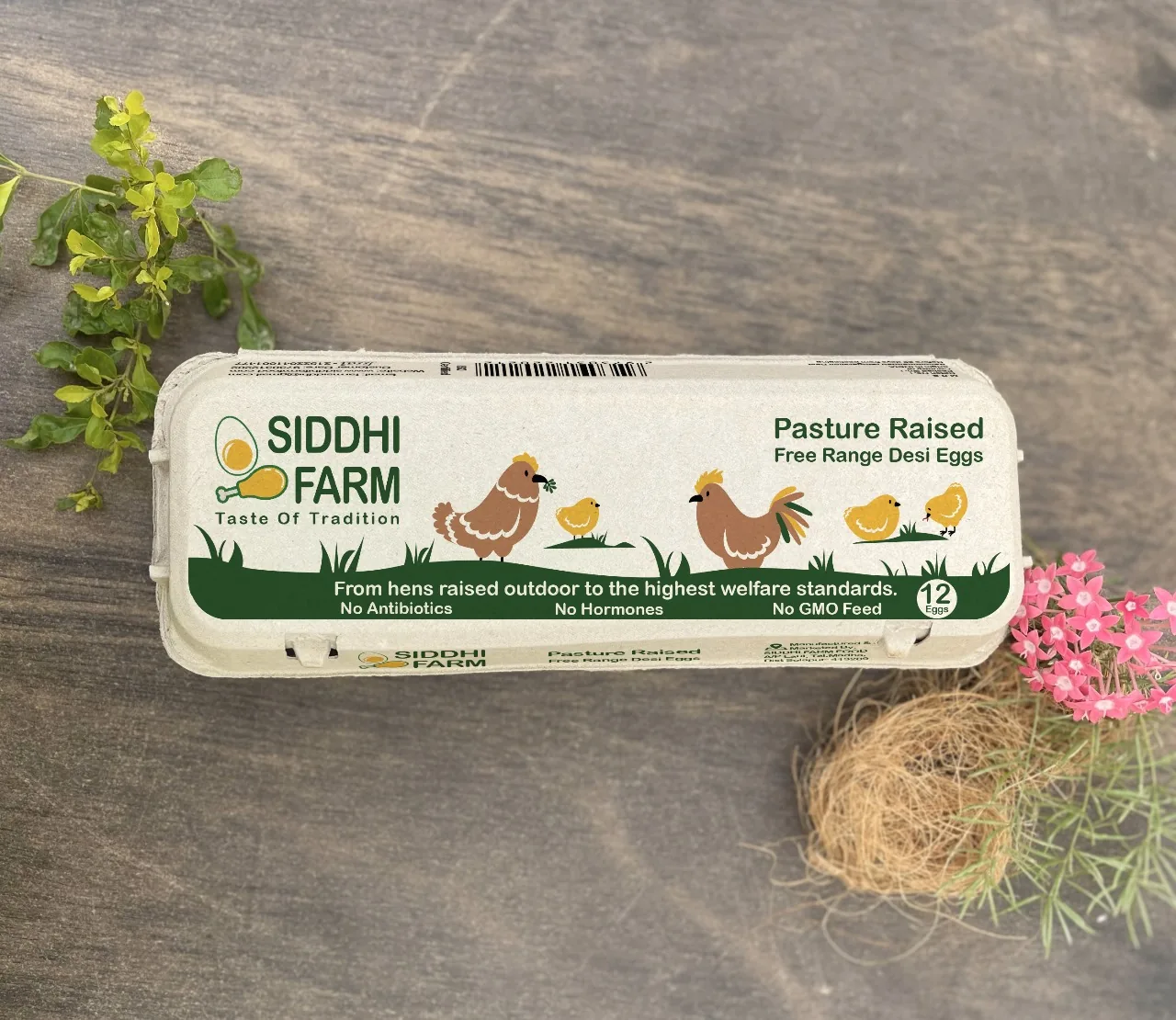 Siddhi Farm 12-egg pack on a wooden table with flowers